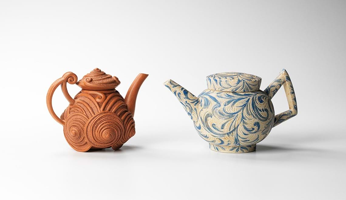 Two teapots by artist Bruce Nuske