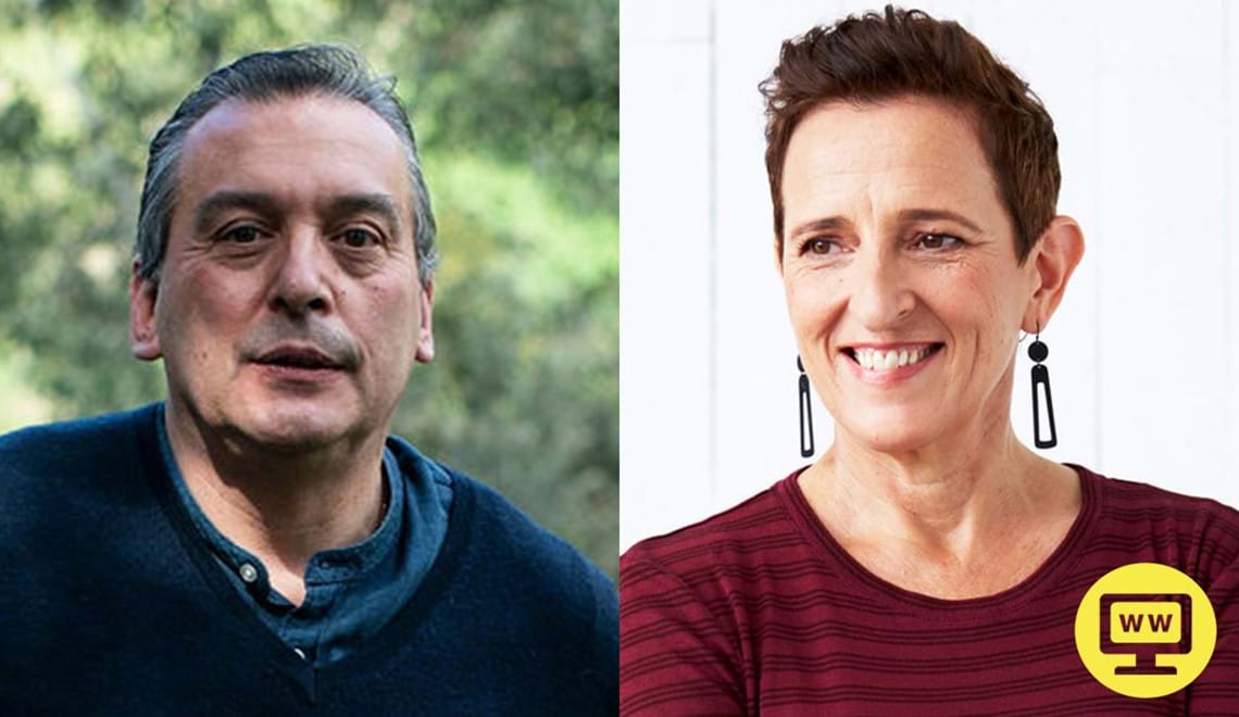 Christos Tsiolkas and Charlotte Wood are smiling. Christos wears a blue knitted jumper over a blue shirt, he has short hair. Charlotte wears a red striped shirt and black earrings, she has short hair.