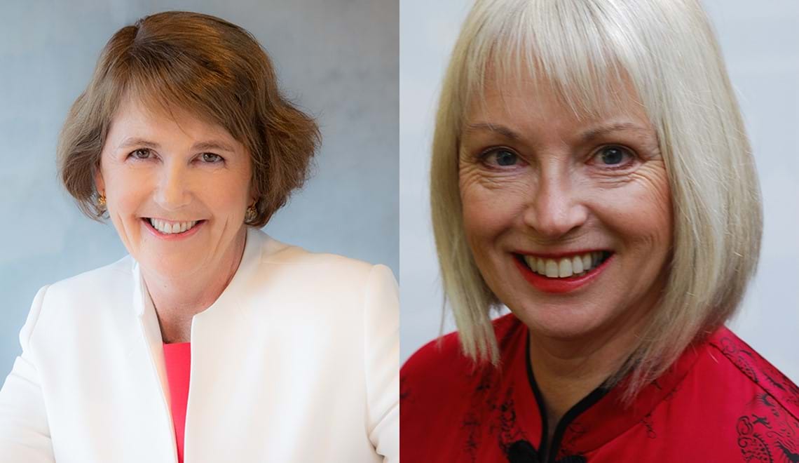 Bernadette Brennan has short, light brown hair; she wears a white jackets and is smiling at the camera. Joyce Morgan has a white bob with a fringe and is wearing a red top while smiling at the camera.